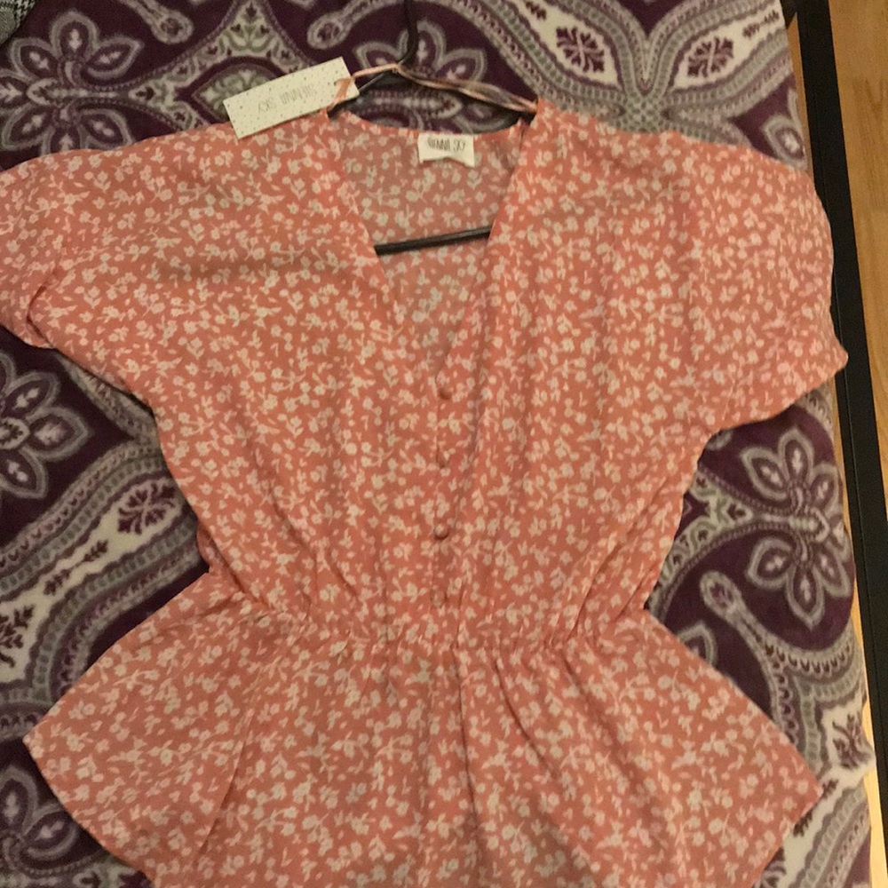 pink and white floral blouse